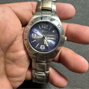 Vintage B.U.M. Equipment Mens Quartz Watch Silver Tone Blue Day Date Dial Workin